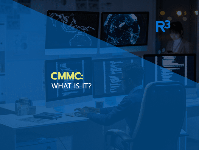 A person sits at a desk with multiple monitors displaying code and digital maps. Overlaid blue graphics feature the text CMMC: WHAT IS IT? and R3 in the top right corner.