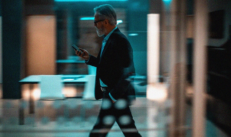 a business man using a smart phone