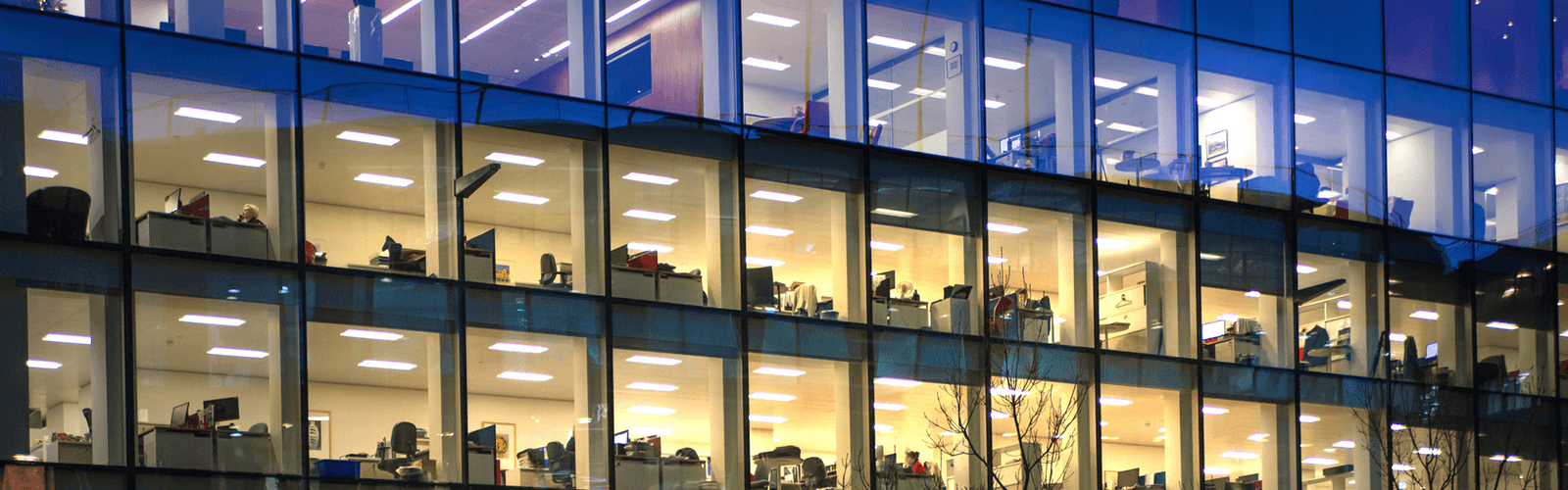 an office building with huge glass windows