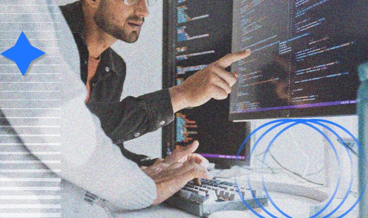 two people working together on code