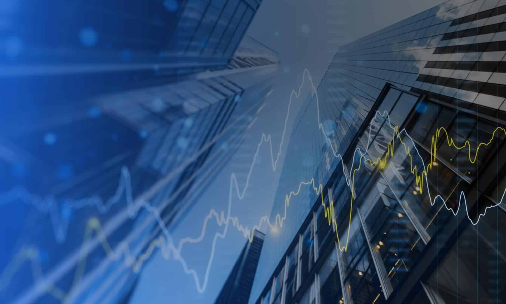 Looking up at tall glass skyscrapers with reflected clouds; overlaid with abstract white and yellow fluctuating financial graph lines, evoking stock market data and the dynamic environment of an R3 Network Operations Center (NOC).
