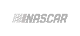 The image shows the NASCAR logo in gray letters with stylized racing stripes to the left of the word NASCAR on a light gray background.