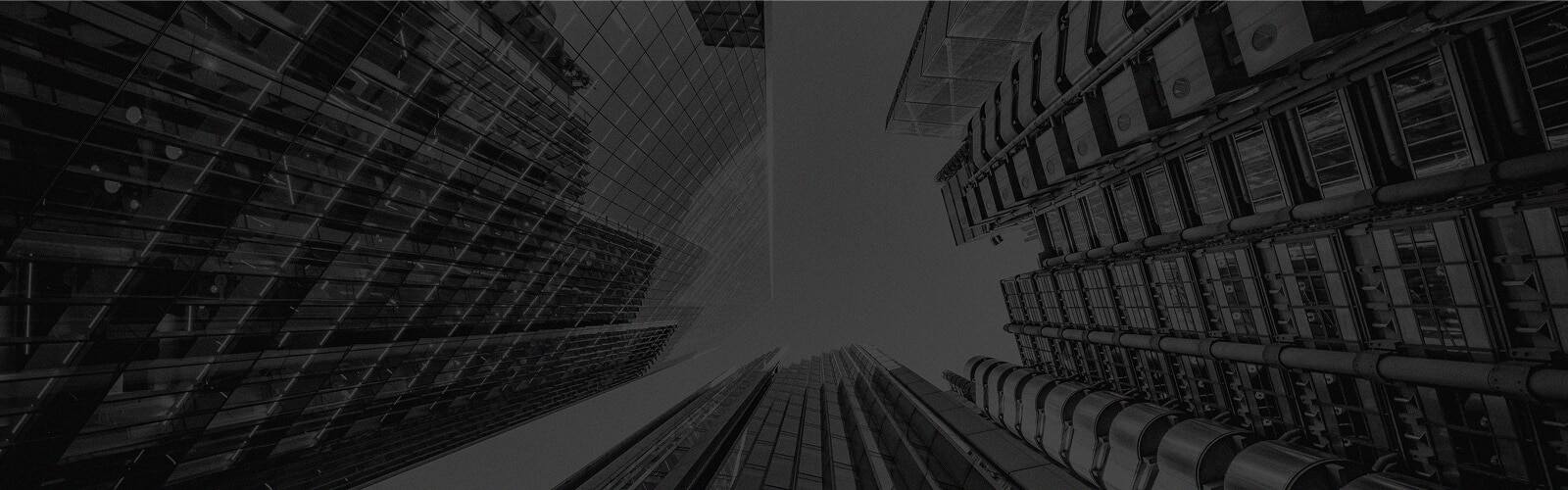 R3 SOC 2 Type II Key Requirements Compliance@2x huge buildings with glass windows