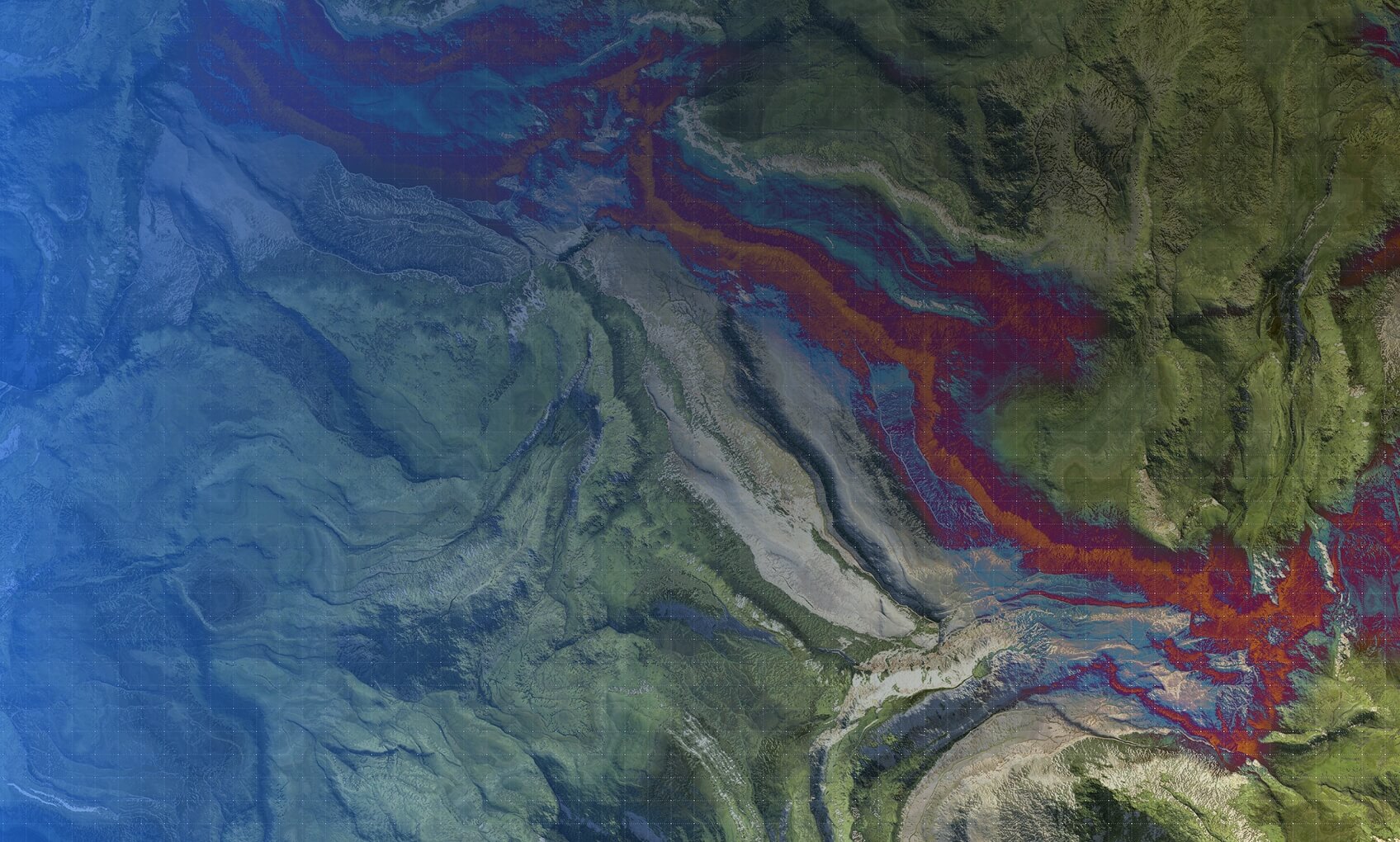 A satellite-like image showing a rugged landscape with green areas, white rocky ridges, and streaks of vivid red, blue, and purple—resembling the dynamic flow of data during an Azure Sentinel Implementation—flowing diagonally across the terrain.