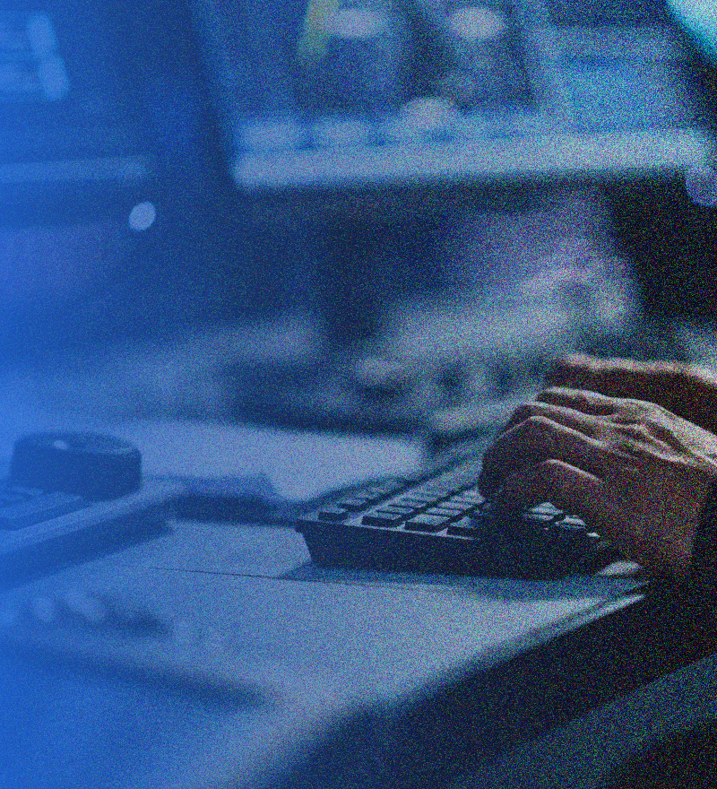 a person typing on a computer