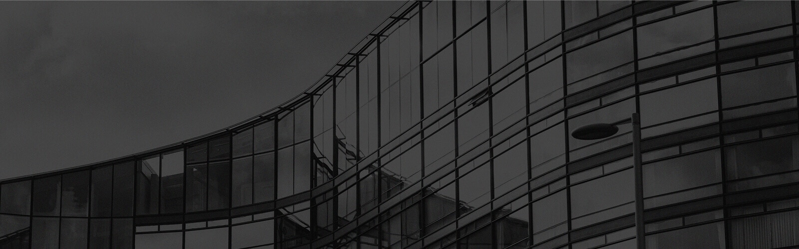 a huge building with floor to ceiling windows