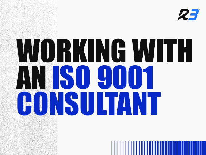 Text graphic with bold black and blue lettering reading WORKING WITH AN ISO 9001 CONSULTANT and a small R3 logo in the top right corner, set on a white background with gray and blue accents.